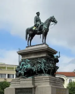 The Tsar Liberator Monument shows a green-patinated bronze equestrian statue on a tall stone pedestal with battle reliefs.