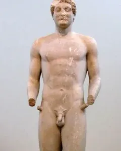 Aristodikos Kouros, a nude marble male statue with missing forearms, standing on a base.