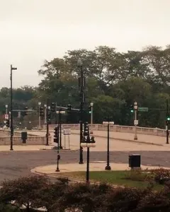 The Bowman and The Spearman bronze equestrian statues on pedestals flanking a roadway.