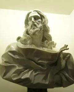 Bust of the Saviour, a white marble bust of a bearded man with long wavy hair and draped robes, gazing upward.