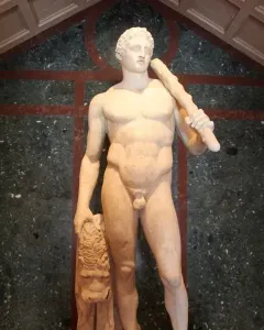 Lansdowne Heracles, a marble statue of a nude muscular man holding a club over his shoulder beside a lion skin.
