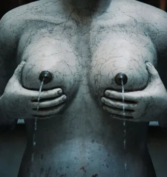 Fontana delle Tette stone sculpture with water flowing from the breasts.