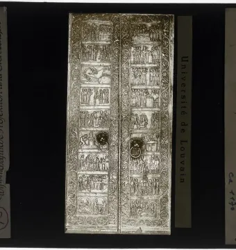 Gniezno Doors with bronze relief panels and circular door knockers