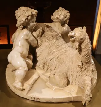 The Goat Amalthea sculpture showing two cherubic children with a recumbent goat.