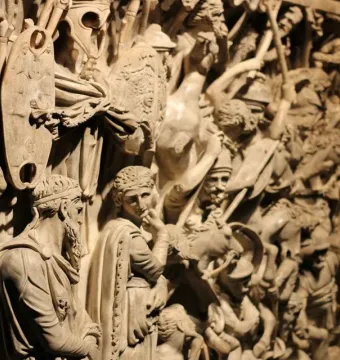 Portonaccio Sarcophagus relief showing a crowded battle scene with armored warriors and horsemen.