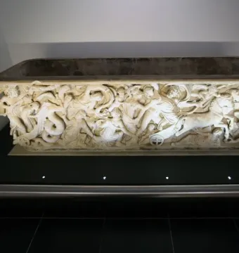 Proserpina Sarcophagus with a richly carved high-relief scene of figures, horses, and serpents