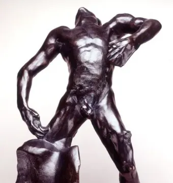 The Falling Man bronze sculpture showing a male figure arching backward on a block-like base.