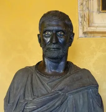Capitoline Brutus bronze bust with inlaid eyes and draped shoulders