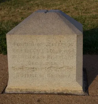 Jefferson Pier stone marker with a slanted top and engraved historical text.