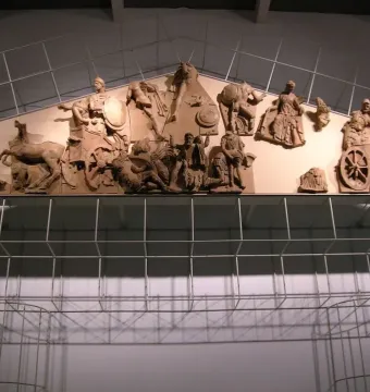 Talamone Pediment terracotta relief with warriors, horses, and chariots in a battle scene