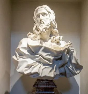 Bust of the Saviour, a white marble bust of a bearded man with long wavy hair, shown on a tiered pedestal.