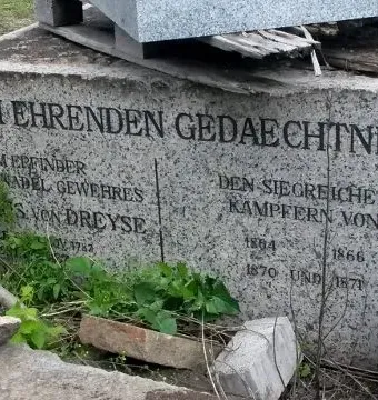 Granite base of the Dreyse Monument with the inscription \