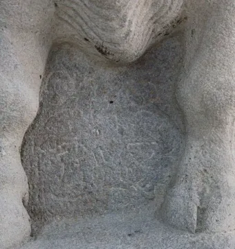 Close-up of the Çineköy inscription carved into a weathered stone surface.