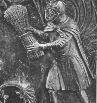 Bernward Doors relief of a bearded man carrying a sheaf of grain