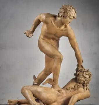 Perseus and the Gorgon sculpture showing a nude winged Perseus standing over Medusa with snake-like hair.