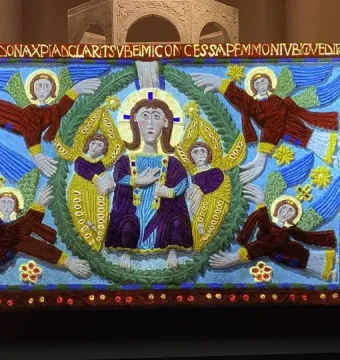Rachis Altar with a haloed figure in a purple robe, surrounded by angels against a blue background.