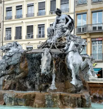 Fontaine Bartholdi fountain with a seated female figure and rearing horses in Lyon