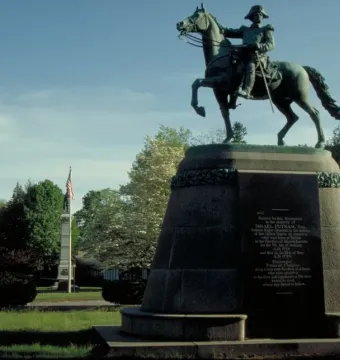 Israel Putnam Monument, an equestrian bronze statue on a granite pedestal outdoors.