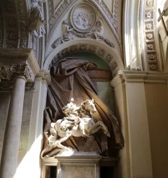 The Vision of Constantine, a white marble equestrian statue of a rearing horse framed by ornate architecture and dark drapery.
