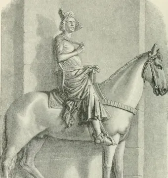The Bamberg Horseman, a crowned male figure seated on a horse in profile on a decorative base.