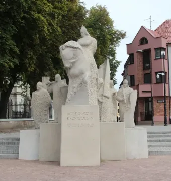 Bolesław III Wrymouth Monument in Płock, showing a mounted central figure with smaller figures on a stone base.