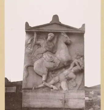 Stele of Dexileus showing a carved horseman triumphing over a fallen figure.