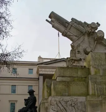 Royal Artillery Memorial with a howitzer on top and a bronze soldier figure at the base.