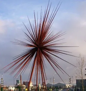 B of the Bang sculpture with long reddish-brown spikes radiating from a central point.