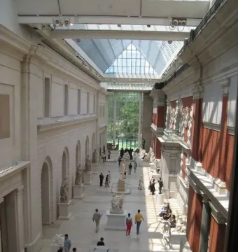 Ugolino and His Sons, a large stone sculpture of intertwined male figures in a museum hall.