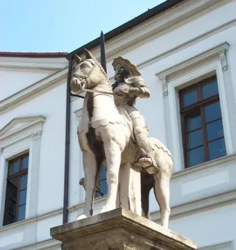 Haldensleben Roland stone equestrian statue on a pedestal in front of a building