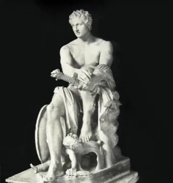 Ludovisi Ares seated on a pile of weapons with a small winged figure at his feet.