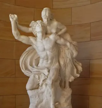 Mercury and Psyche sculpture by Reinhold Begas, showing a winged male figure and a woman beside a stone wall.