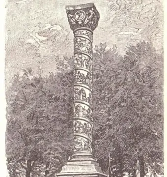 The Bernward Column shown as a tall spiral-relief column on a stepped square base with an inscription panel.