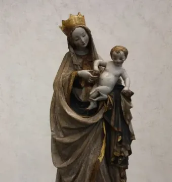 Beautiful Madonna of Wrocław statue of a crowned woman holding a child