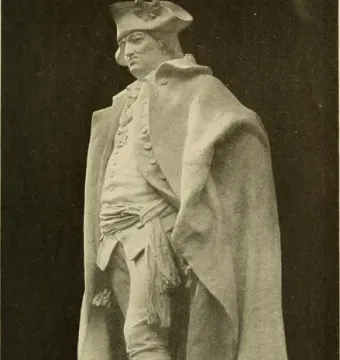 Full-length statue of Major General Friedrich Wilhelm von Steuben in a tricorn hat, cloak, and military coat on a stone base.