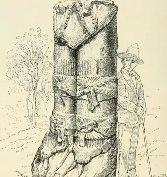 Atlantean Figures at Tula, a carved stone warrior figure shown beside a man for scale.