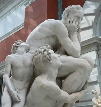 Ugolino and His Sons marble sculpture showing a distressed seated man with two emaciated sons pleading around him