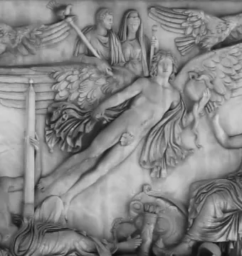 Relief on the Antoninus Pius Column showing a winged figure rising between eagles, surrounded by draped and seated classical figures.