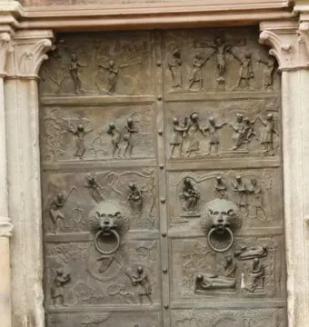 Bernward Doors bronze double door covered with relief panels and lion-head knockers