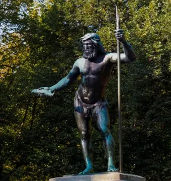 Rhine Water Fountain bronze statue of a bearded man holding a spear and fish beside a pedestal inscribed Argentorato