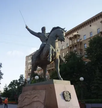 Pyotr Bagration Monument, an equestrian statue on a tall granite pedestal in a city square.