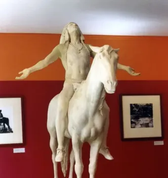 Appeal to the Great Spirit sculpture of a rider on a horse with arms outstretched and head tilted upward