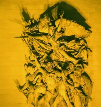 La Marseillaise stone relief on the Arc de Triomphe, showing a winged figure above armed figures in dramatic movement.