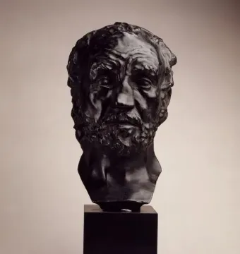 Bust of Man with the Broken Nose showing an older bearded man with a crooked nose on a black pedestal.