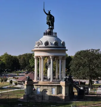 Hermann Heights Monument with a towering statue of Arminius holding a sword aloft above a white-domed pavilion