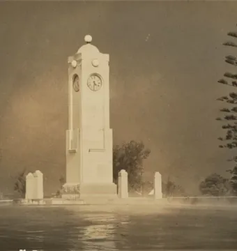The Edith Cowan Memorial with a light-colored clock tower, domed cap, and surrounding pillars.