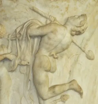 Borghese Vase relief showing a nude dancing satyr with a staff, beside a lyre player and a small crouching creature.