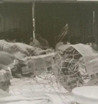 Wire mesh Alebrije structure being covered with newspaper and paper.