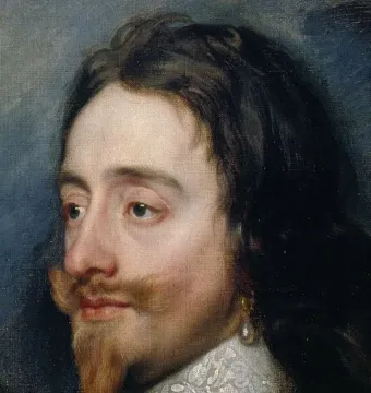 Bust of King Charles I with long wavy hair, a mustache, and a pointed goatee, wearing a lace collar and pearl earring.