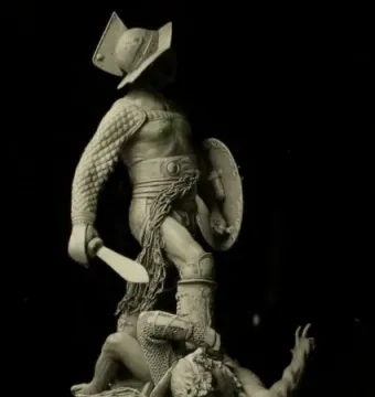 The Gladiators bronze sculpture showing an armored warrior standing over a fallen adversary.